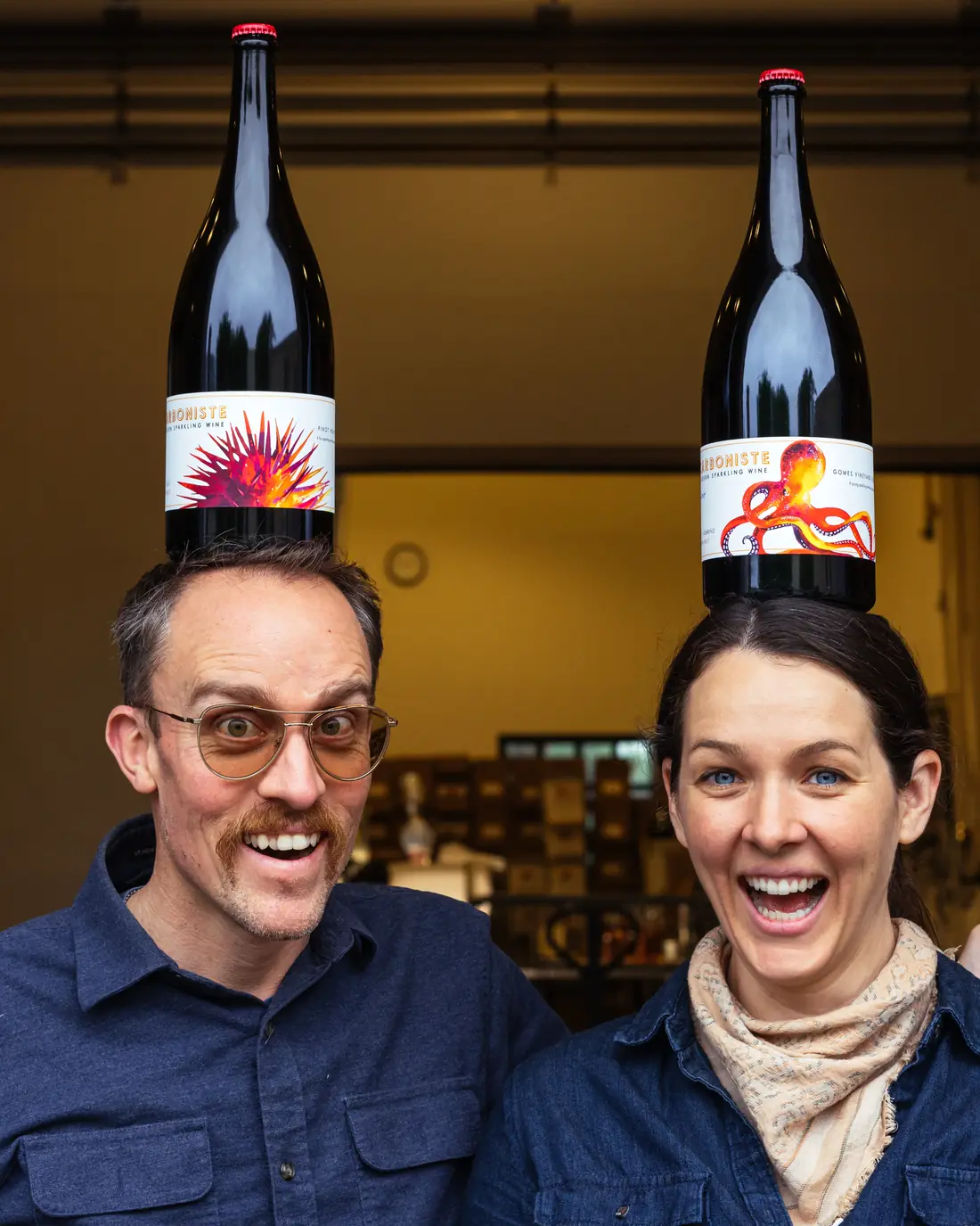 CARBONISTE founders balancing magnums of their sparkling wine